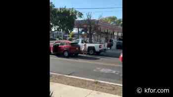 VIDEO: Woman hits truck with bat, truck rams her in Albuquerque road rage incident