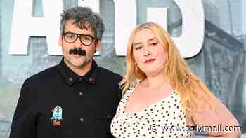 Jonathan Ross' daughter Honey, 29, shows off her curves in a polka dot dress as she cosies up to boyfriend Gav Murphy, 40, at The Dog Stars premiere