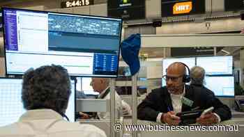 Wall Street closes lower as US bond yields rise