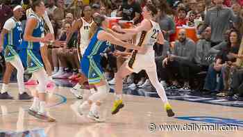 Caitlin Clark clashes with WNBA rival Paige Bueckers in heated on-court exchange during Fever defeat