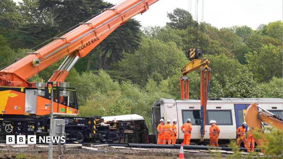 Train derailment carriages moved amid track probe