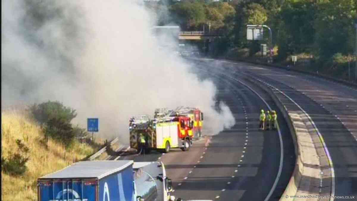 M6 fire LIVE as motorway closed with 100-minute traffic delays after lorry bursts into flames