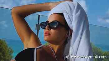 Christine McGuinness poses in her bikini to take part in viral trend as she says it's 'kind of chic to be unavailable'