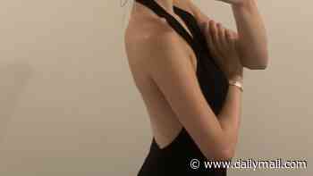 Woman is banned from wearing backless dress to a Post Office after owner warned they 'can't allow too much exposure' in store