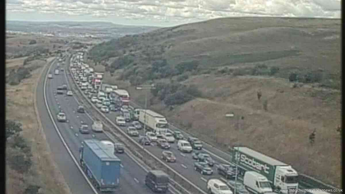 M62 traffic LIVE with huge delays and lanes shut after car fire