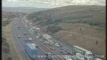 M62 traffic LIVE with huge delays and lanes shut after car fire