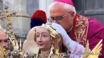 Vatican cardinal kisses 1,700-year-old skull in rare ancient Catholic ritual that divides Christians