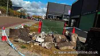Car smashes into wall near Dowlais shop before driver flees