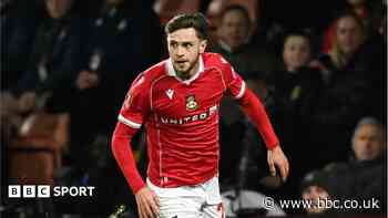 MK Dons sign Barnett on loan from Wrexham