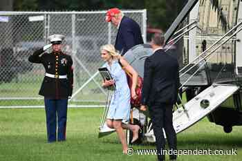 New photos show ‘Natalie Harp sprinting after Trump’s golf cart’ in 2023