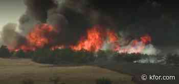 Large fire near Binger continues into Friday evening