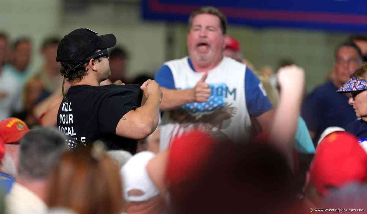 Protester ejected from Trump rally was wearing 'Kill Your Local Pedophile' shirt