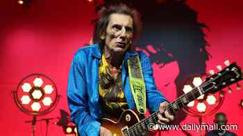 Ronnie Wood, 79, is supported by his wife Sally, 48, and his daughters as he and Imelda May command the stage in his first solo show in 16 years