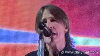 Keith Urban performs song about an ex whose found 'somebody else' before tearing up in front of fans at concert... amid Nicole Kidman's rumored new romance