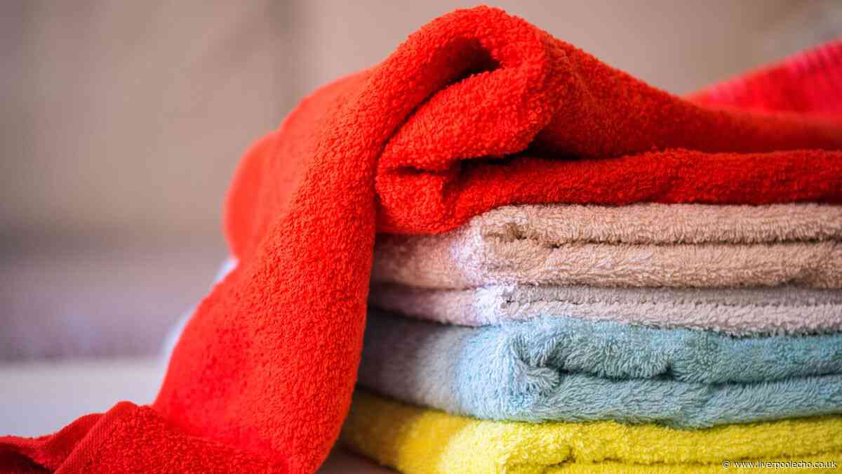 Remove mildew smells from towels by adding 2 ingredients to the washing