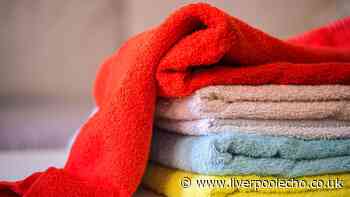 Remove mildew smells from towels by adding 2 ingredients to the washing