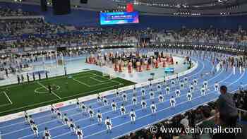 On your marks, get set, robo! World Humanoid Robot Games begin in Beijing with more than 2,000 robots to star in five-day event - but it's a painful start for some