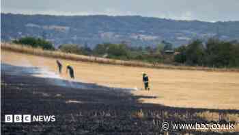 Fire service fighting wild fire 'on two fronts'
