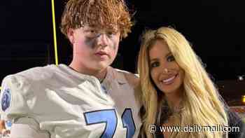 Kim Zolciak's ex Kroy Biermann picks up 15-year-old son KJ's football jersey in first sighting since teen was arrested for alleged changing room sex assault