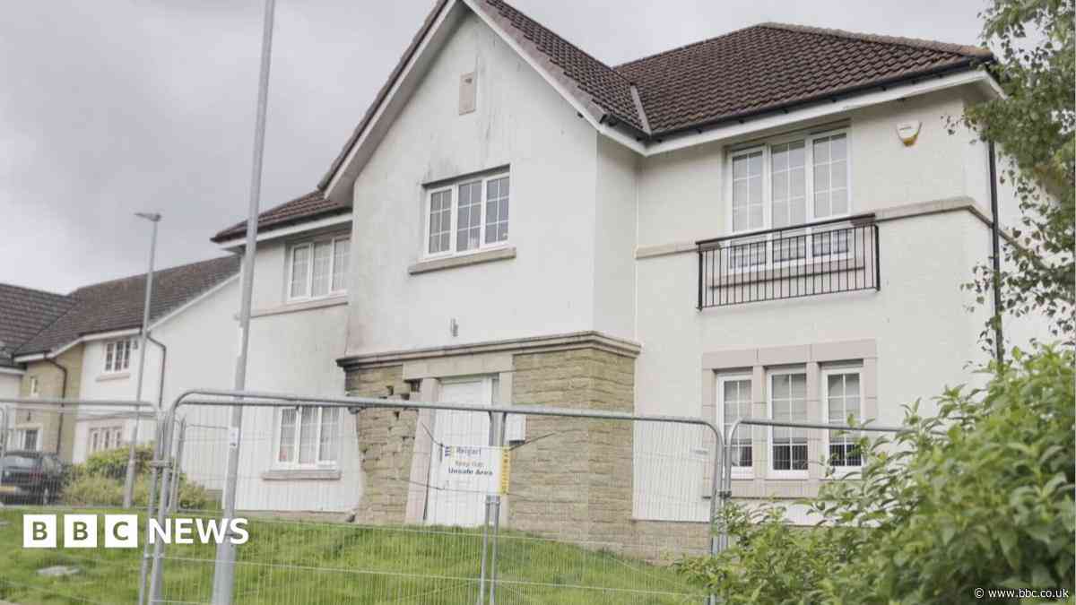 Police investigate car crash into house in Glasgow suburb
