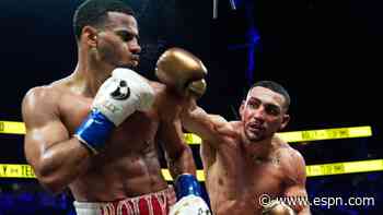 Lopez wrests Romero's title, now 3-weight champ
