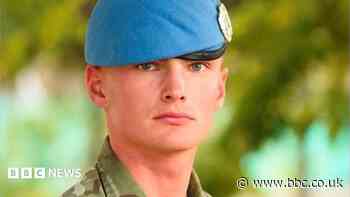 Two men re-arrested after death of soldier