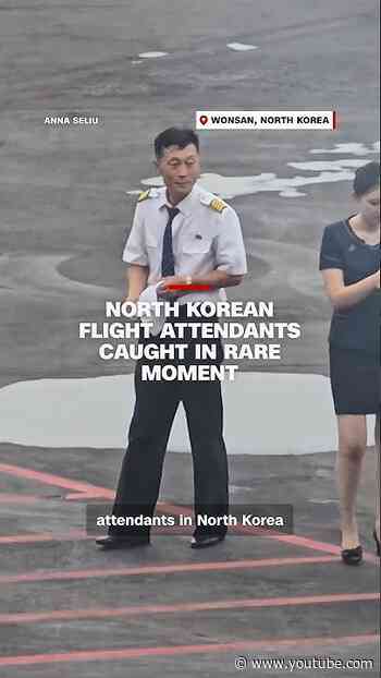 North Korean flight attendants caught in rare moment
