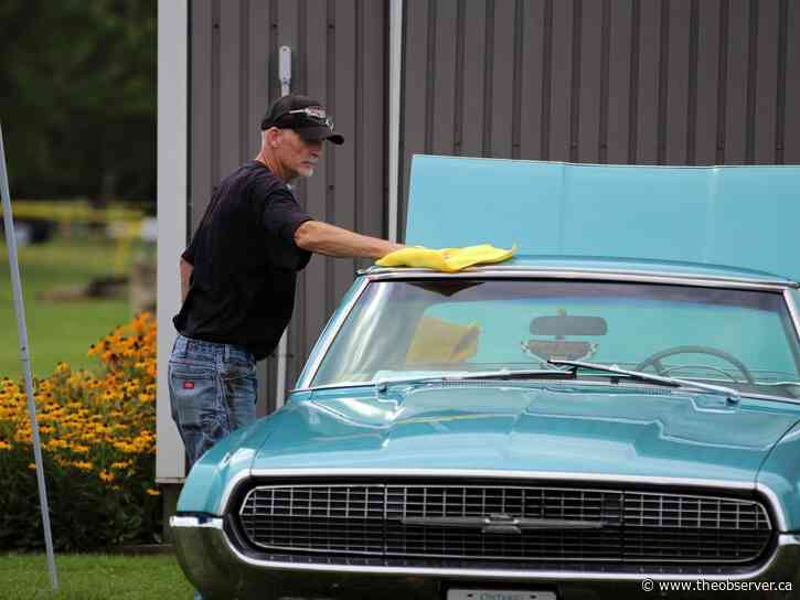 Wet weather doesn’t stop Wheels and Wells Car Show