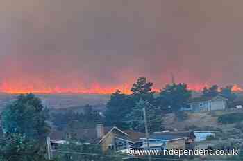 Wildfire approaches Reno, Nevada, forcing thousands to evacuate their neighborhoods