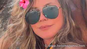Heidi Klum, 53, branded a 'tease' as she strips down for sultry sunbathing photo on the beach