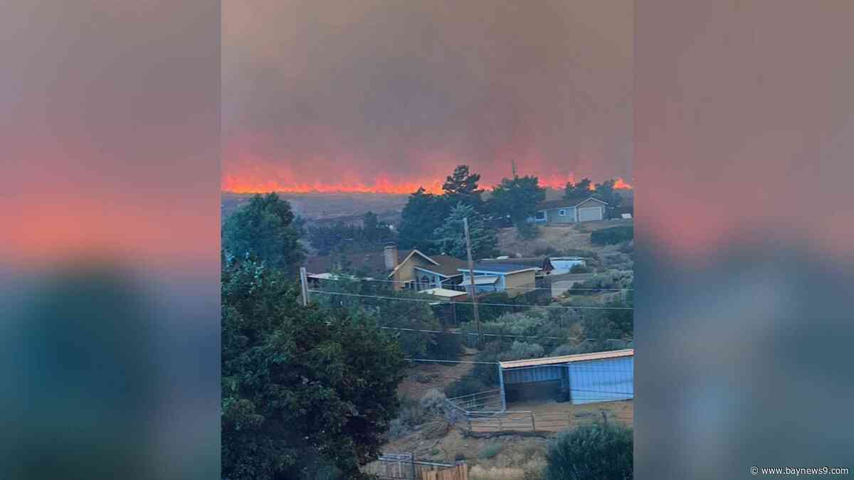 Wildfire approaches Reno, Nevada, forcing thousands to evacuate their neighborhoods