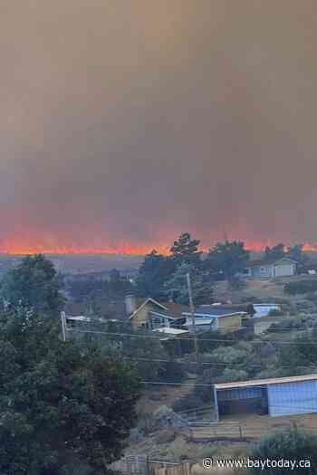 Wildfire started by humans approaches Reno, Nevada, forcing thousands of evacuations