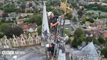 Team with a head for heights keeps cathedral safe from lightning