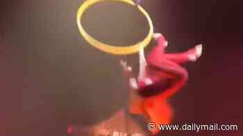 Circus acrobat who plunged 15 feet in front of a horrified crowd and shattered a dozen bones on impact is now SUING Cirque du Soleil for nearly $17 million