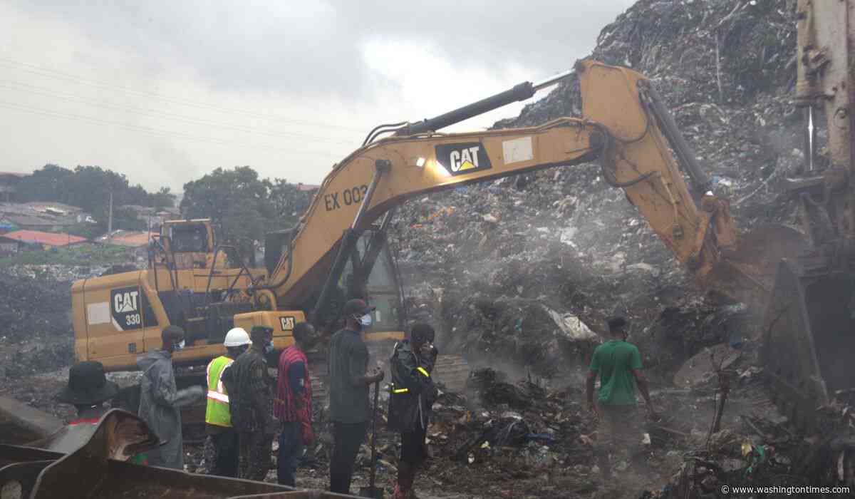 A landslide at a landfill in the capital of Guinea kills 30 people, officials say