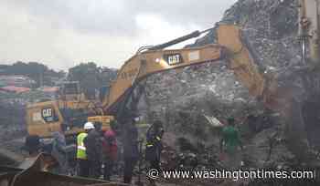 A landslide at a landfill in the capital of Guinea kills 30 people, officials say