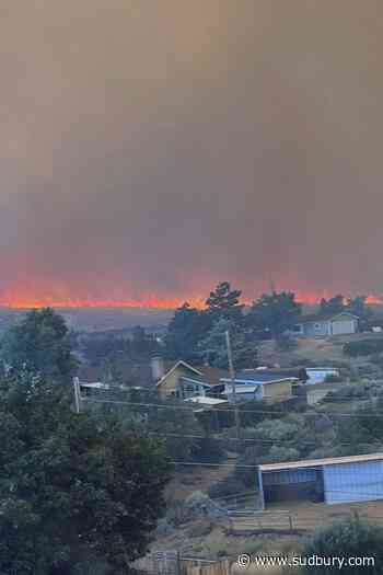 Human-caused wildfire approaches Reno, Nevada, forcing thousands of evacuations