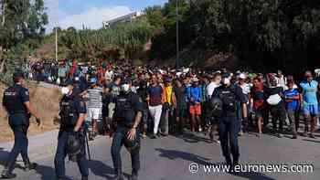 Spain moves hundreds of migrants from Ceuta beach to temporary shelters