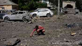 Kyiv residents search through the wreckage after Russia’s deadly barrage