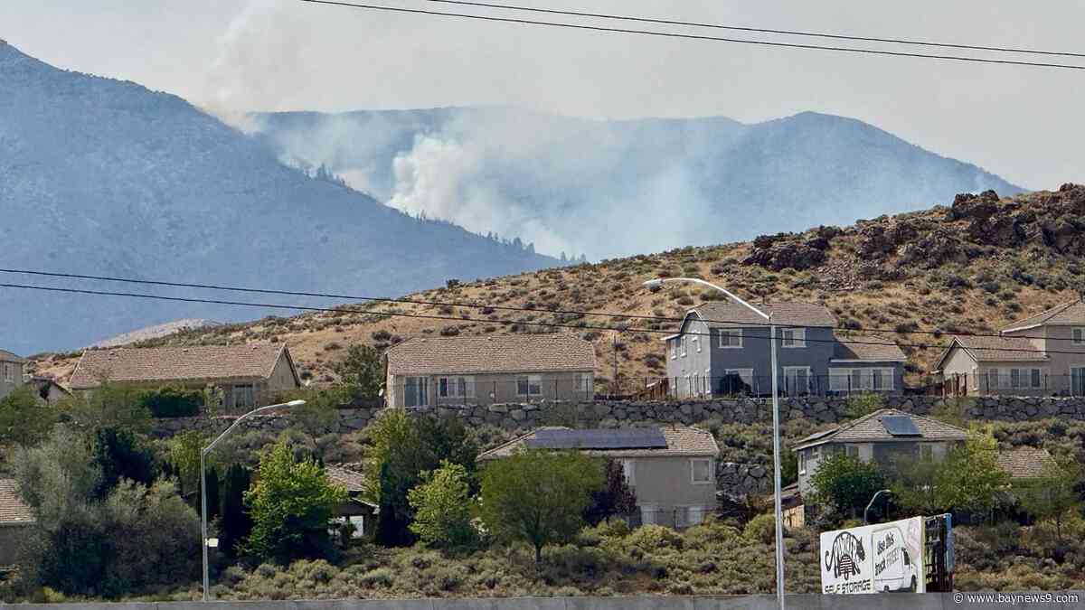 Fast-moving wildfire amid shifting winds threatens Reno, Nevada, forcing thousands to evacuate