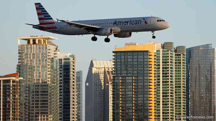 American Airlines flight lands safely after laptop battery catches fire on board; passenger injured