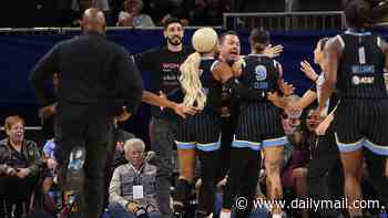 WNBA star held back by security as she angrily confronts ex-NBA player who has declared for draft... before he is EJECTED