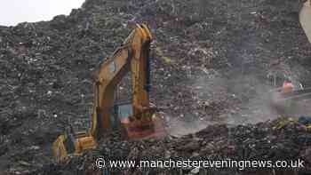At least 30 killed and six injured after landslide at huge landfill