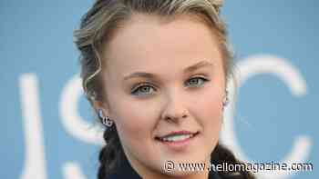 JoJo Siwa strips down for loved-up pool moment with Chris Hughes in intimate new photos