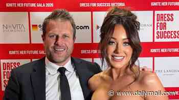 Nathan Buckley's ex-girlfriend Brodie Ryan shows him what he's missing as she busts out of a strapless gown at Melbourne gala and poses with AFL star Campbell Brown