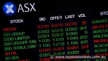 Aussie shares advance as mining stocks hit record highs
