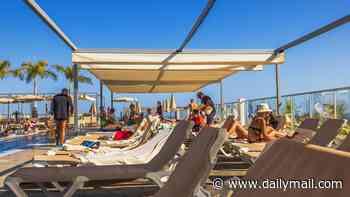 How to spot a Brit abroad! The tell-tale holiday habits that give us away - from packing teabags and downing airport pints to always getting sunburnt