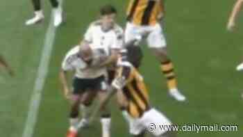 Harry Maguire is caught tackling his OWN TEAM-MATE in new angle of Man United's defensive horror show - as Luke Shaw's comments spark concern about weaknesses