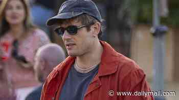 James Norton flies under the radar in a cap and shades as he parties with friends at All Points East festival