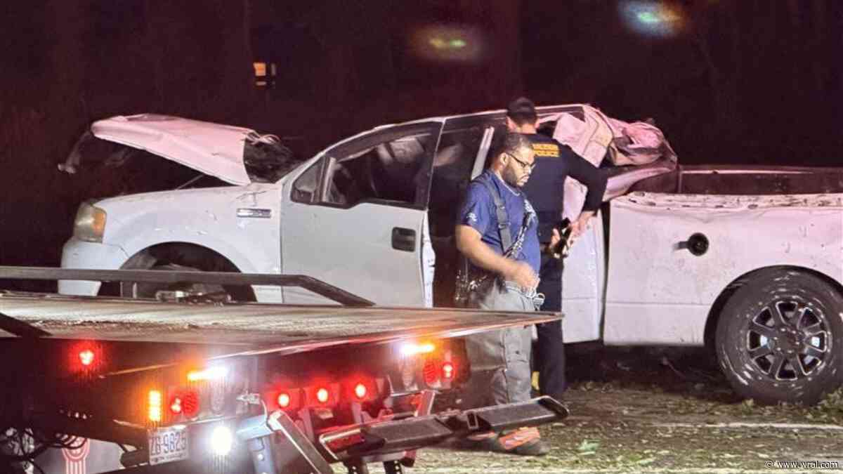 Driver arrested after truck flips on Falls of Neuse Road in Raleigh